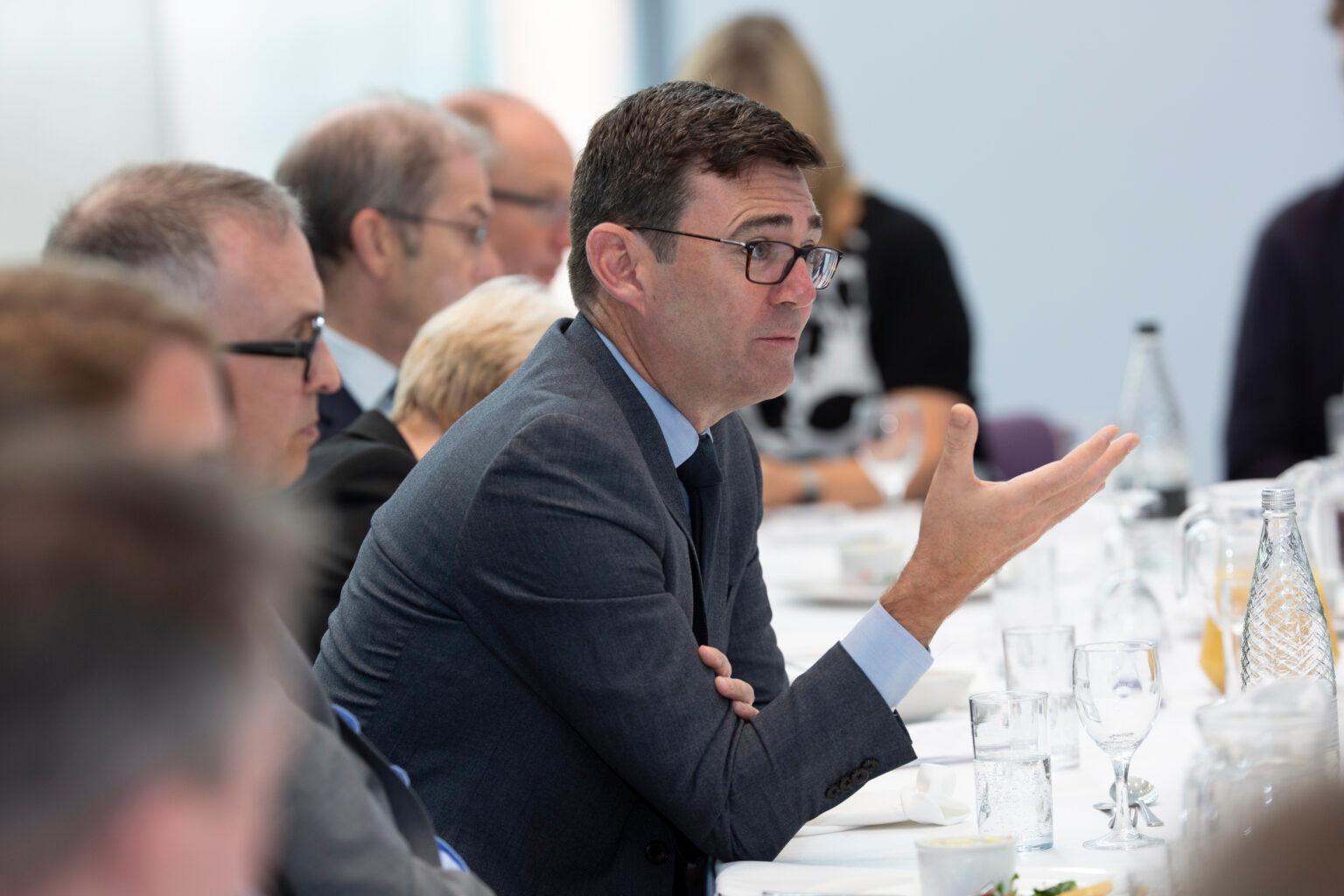 Andy Burnham speaking at a lunch with business leaders